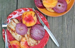grilled pork chops with peaches and red onions